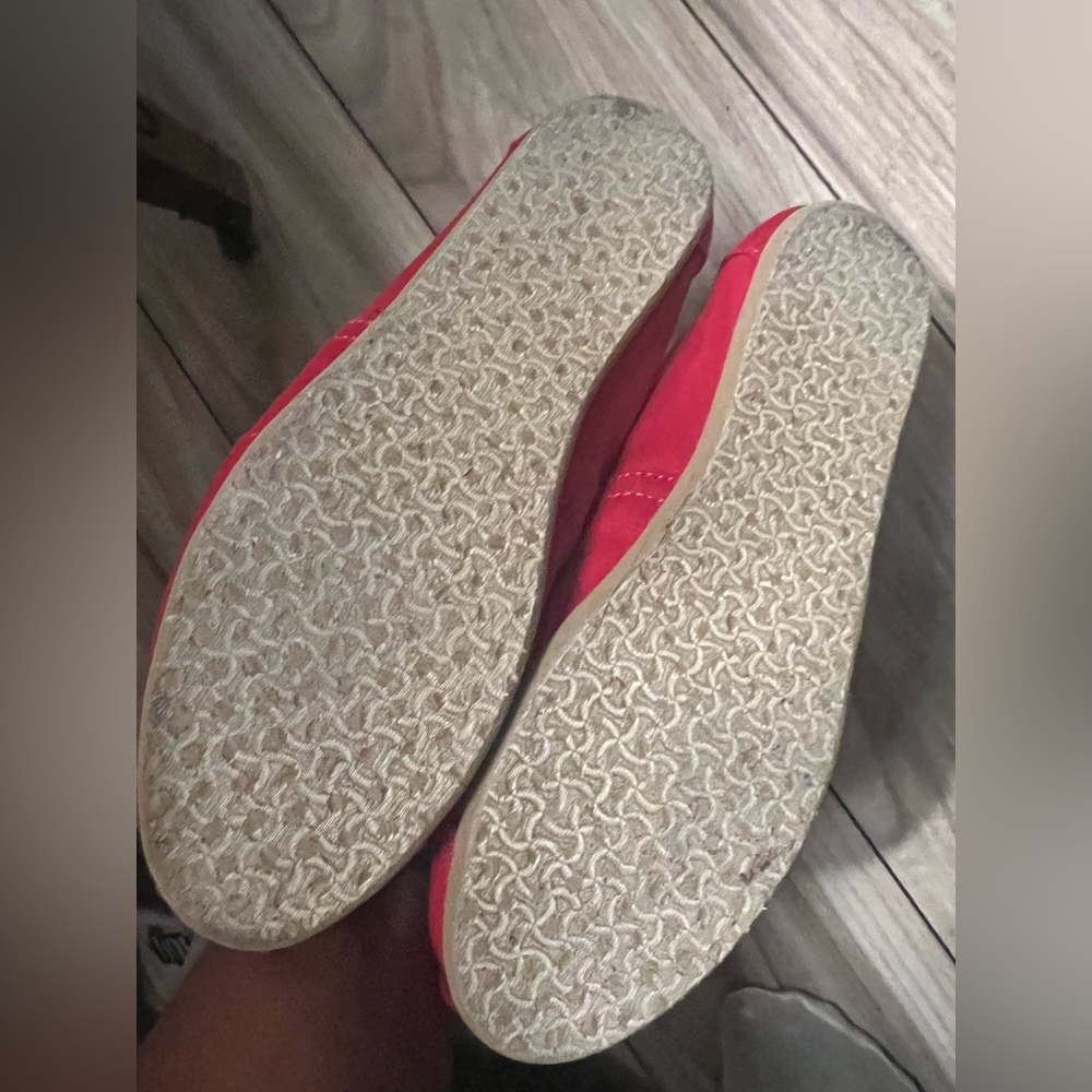 Toms red shoes never worn